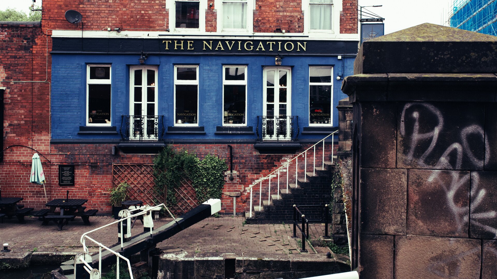 A canalside pub called The Navigation beside a lock